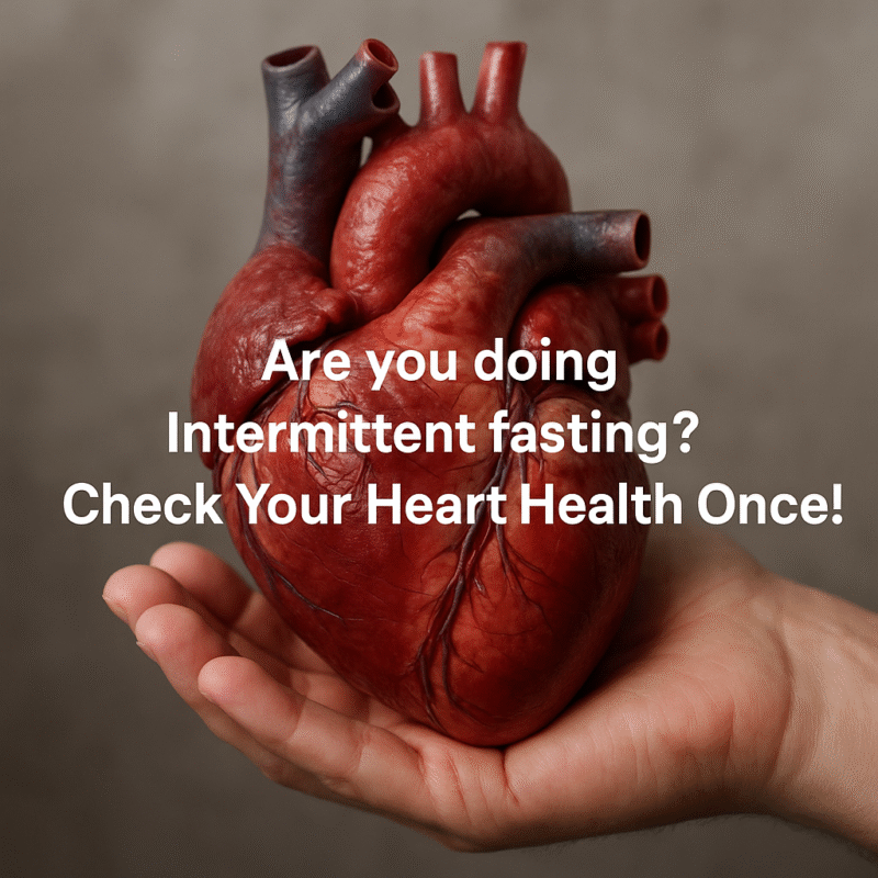 Realistic human heart held in a hand with text overlay: "Are you doing Intermittent fasting? Check Your Heart Health Once!"
